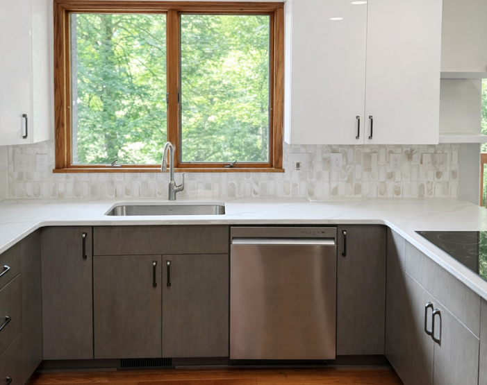 Modern kitchen cabinets and countertops with custom tile backsplash
