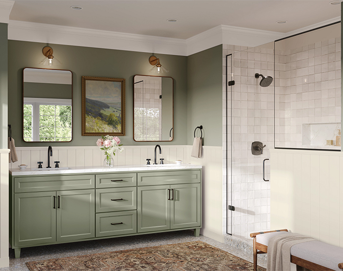 Bathroom with green cabinetry and walk-in shower