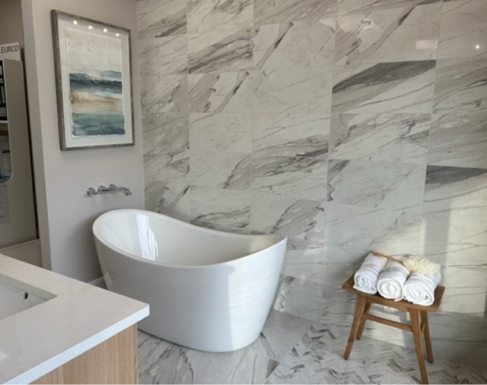 Marble wall tile on a bathroom wall with freestanding tub